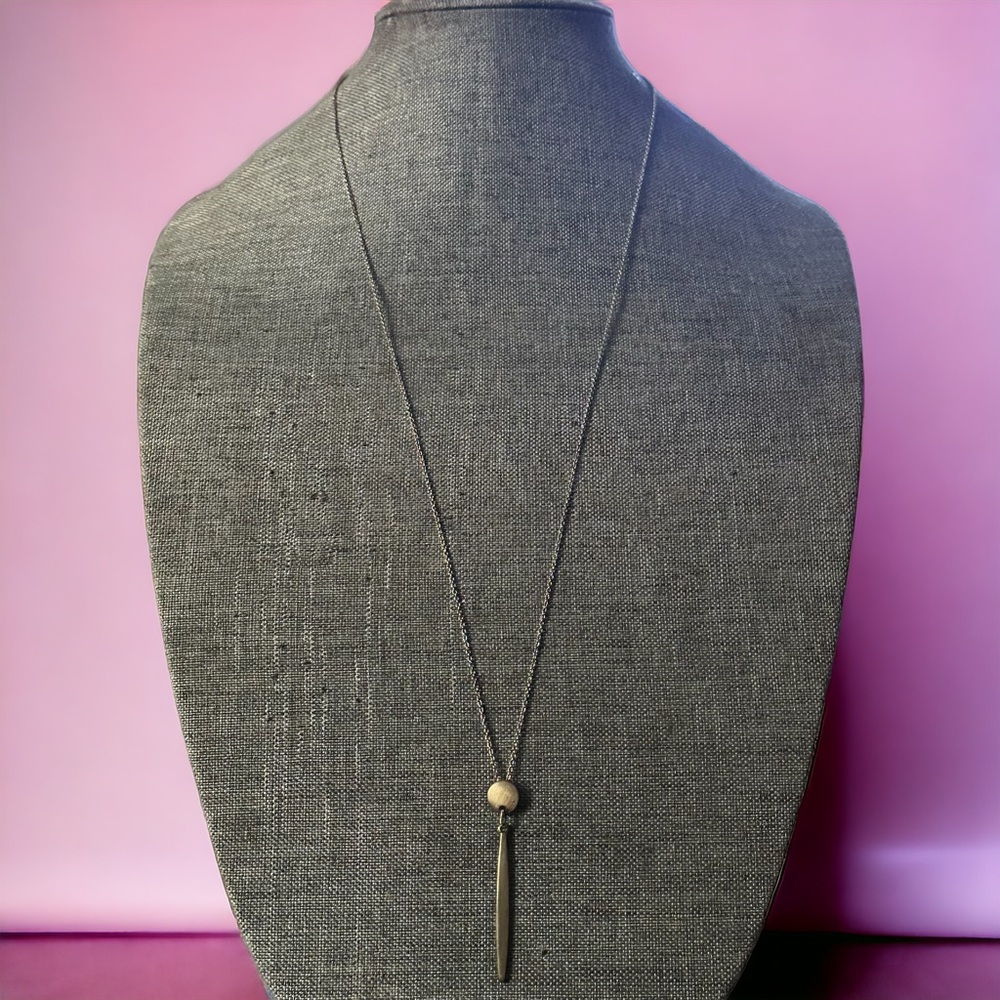 Howard’s long dangle pendant necklace
